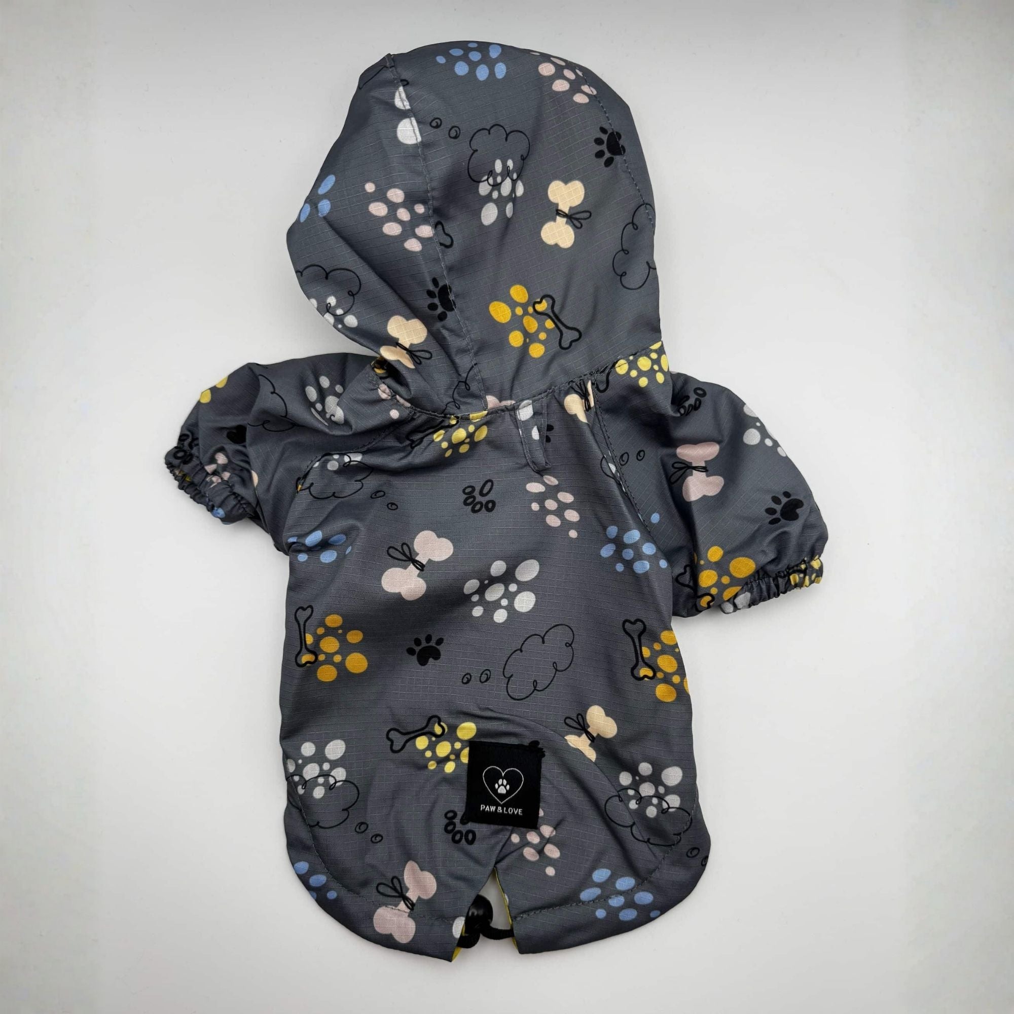 Hooded Waterproof Dog Raincoat with Paw & Bone Print by Paw & Love